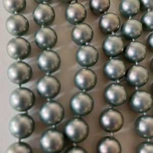Gorgeous silver-gray faux pearl necklace. 68” long!